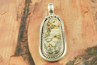 Genuine Dry Creek Turquoise set in Sterling Silver Pendant. Free 18
