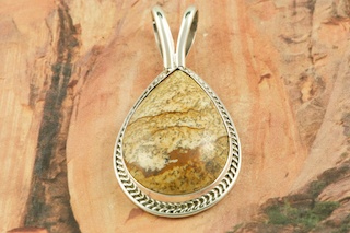 Mother Nature is Amazing! The pattern in the stone called the matrix is all natural. Every stone is unique. Stunning Pendant featuring Genuine Picture Jasper set in Sterling Silver. Free 18