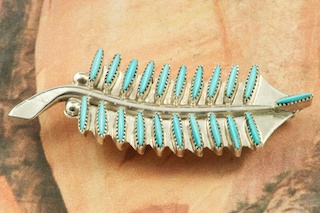 Genuine Sleeping Beauty Turquoise set in Sterling Silver Pendant. Can also be worn as a Brooch. Beautiful Needle Point Design. The Sleeping Beauty Turquoise Mine is located in Gila County, Arizona. Free 18