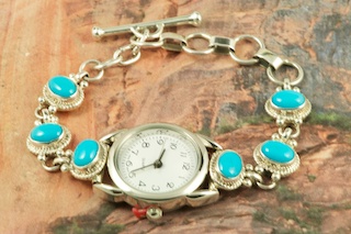 Genuine Sleeping Beauty Turquoise set in Sterling Silver. The Sleeping Beauty Turquoise mine is located in Gila County, Arizona. Ladies Watch Bracelet Created by Navajo Artist Geneva Chavez. Signed by the artist.