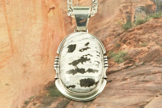 White Buffalo Turquoise set in Sterling Silver Pendant. This Beautiful Stone is formed from the minerals Calcite and Iron. It is mined near Tonopah Nevada. Free 18