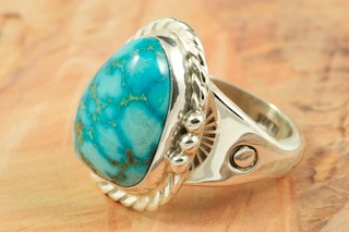 Genuine Candelaria Turquoise set in Sterling Silver Ring. The Candelaria mine is located in Esmeralda County, Nevada. Candelaria Turquoise is very rare and extremely hard to come by. Created by Navajo Artist Flora Willeto. Signed by the artist.