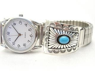 Genuine Sleeping Beauty Turquoise Stones set in Sterling Silver Watch Tips. Men's quartz watch with expandable band. Created by Navajo Artist Thomas Chischilly.