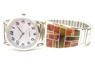 Genuine Spiny Oyster Shell and Picture Jasper inlaid between ribbons of Sterling Silver. Mens watch with expandable band. Created by Navajo Artist Calvin Begay. Signed.