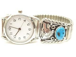 Genuine Sleeping Beauty Turquoise set in Sterling Silver Watch Tips. Sterling Silver Wolf design. Mens Watch with expandable band. Created by Navajo Artist Thomas Chischilly. Signed.