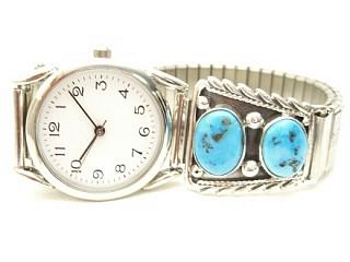 4 Genuine Sleeping Beauty Turquoise Stones set in Sterling Silver Watch Tips.  Mens Watch with expandable band. Created by Navajo Artist Thomas Chischilly