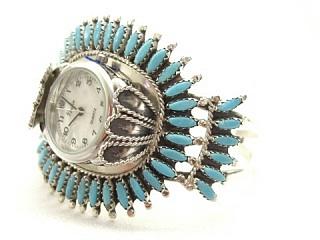 Genuine Sleeping Beauty Turquoise set in Sterling Silver Watch Bracelet.
Beautiful Petit Point Design. Created by Navajo Artist Tom and Rosemary Nez. Signed.


