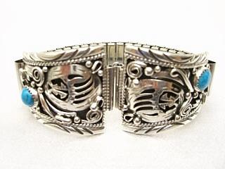 Genuine Sleeping Beauty Turquoise set in Sterling Silver. Mens Watch Tip with expandable band. Bear Paw Design. Created by Navajo Artist Rita Dawes.