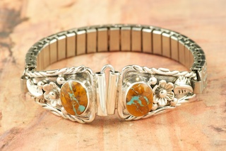 Genuine Boulder Turquoise set in Sterling Silver. Ladies Watch Tips with expandable band. Created by Navajo Artist Larson Lee.