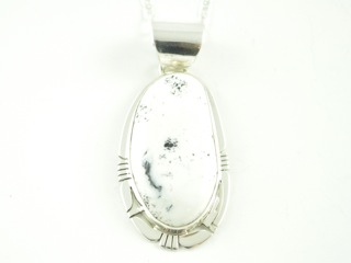 White Buffalo Turquoise set in Sterling Silver Pendant. This Beautiful Stone is formed from the minerals Calcite and Iron. It is mined near Tonopah Nevada. Free 18