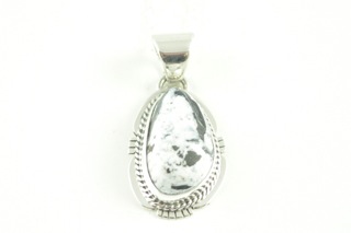 White Buffalo Turquoise set in Sterling Silver Pendant. This Beautiful Stone is formed from the minerals Calcite and Iron. It is mined near Tonopah Nevada. Free 18