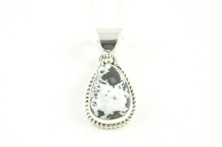 White Buffalo Turquoise set in Sterling Silver Pendant. This Beautiful Stone is formed from the minerals Calcite and Iron. It is mined near Tonopah Nevada. Free 18