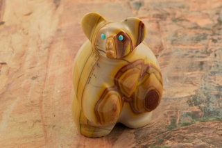 Zuni Bear Fetish created by Zuni artists Vernon Lunasee & Prudencia Quam. Signed by the artist. Carved from Dolomite with Turquoise Eyes. How Cute!