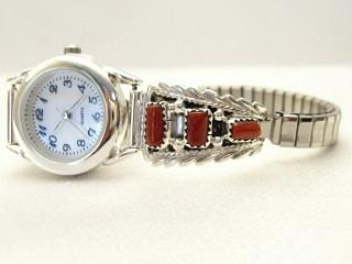 Genuine Coral set in Sterling Silver. Ladies Watch with expandable band. Created by Navajo Artist Pansy Johnson