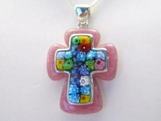 Millefiori Necklace. A beautiful millefiori cross pendant handset in a resin and silver frame. Millacreli combines the beautiful Millefiori patterns with the high-quality Murano art glass and colored resin. Millacreli uses 925 sterling silver with the durable, scratch-resistant colored resin and Millefiori glass to create a unique and colorful jewelry.