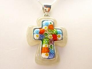 Millefiori Necklace. A beautiful millefiori cross pendant handset in a resin and silver frame. Millacreli combines the beautiful Millefiori patterns with the high-quality Murano art glass and colored resin. Millacreli uses 925 sterling silver with the durable, scratch-resistant colored resin and Millefiori glass to create a unique and colorful jewelry.