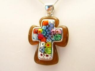 Millefiori Necklace. A beautiful millefiori cross pendant handset in a resin and silver frame. Millacreli combines the beautiful Millefiori patterns with the high-quality Murano art glass and colored resin. Millacreli uses 925 sterling silver with the durable, scratch-resistant colored resin and Millefiori glass to create a unique and colorful jewelry.