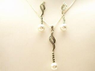 Nickel-free Sterling Silver, Marcasite Necklace & Earrings Set. Beautiful Marcasite set with hanging synthetic pearls. Treasures of the Southwest.com guarantees that our Sterling Silver Jewelry is 925 Sterling or above.