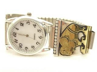 Sterling Silver with Gold overlay. Buffalo Design. Men's Watch with an expandable Band. Created by the Famous Navajo Artist Tommy Singer.