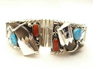 Real Bear Claws and Genuine Sleeping Beauty Turquoise & Blood Red Coral set in Sterling Silver Mens Watch Tips with expandable band. Created by Navajo Artist Mike Arviso.