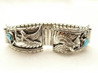 Genuine Turquoise set in Sterling Silver. Mens Watch Tips with expandable band. Beautiful Eagle Design. Created by Navajo Artist Mike Arviso.