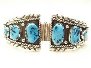 6 Beautiful Genuine Sleeping Beauty Turquoise Stones set in Sterling Silver. Mens Watch Tips with expandable band. Created by Navajo Artist Rita Dawes.