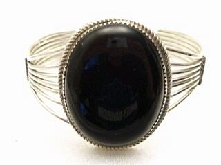 Genuine Onyx set in Sterling Silver Bracelet. Created by Navajo Artist Herman Lee.