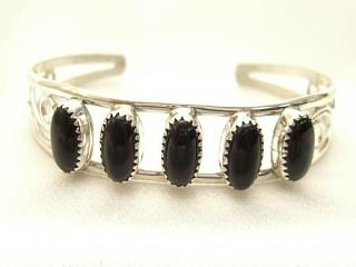 Genuine Black Onyx set in Sterling Silver Bracelet. Created by Navajo Artist Delgarito. Signed