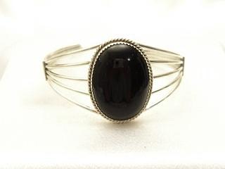 Genuine Black Onyx set in Sterling Silver Bracelet. Created by Navajo Artist Herman Lee.