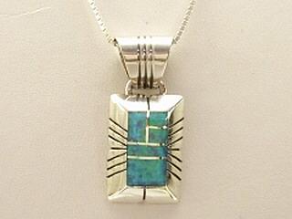 Blue Lab Opal inlaid in Sterling Silver Pendant. Free 18" Sterling Silver Chain with purchase. Created by Zuni Artist Chester Bennally. Signed