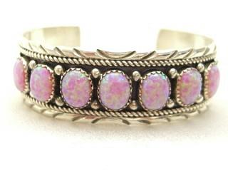 7 Beautiful Fire & Ice Lab Pink Opal Stones set in Sterling Silver Bracelet. Created by Navajo Artist Edison Etsitty. Signed E.