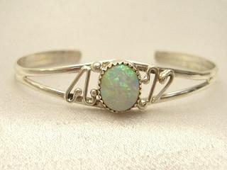 Fire & Ice Lab Opal set in Sterling Silver Bracelet. Created by Navajo Artist Rita Dawes.