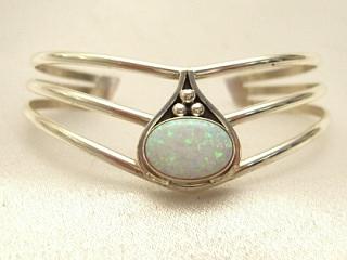 Fire & Ice Lab Opal set in Sterling Silver Bracelet. Created by Navajo Artist Edison Etsitty