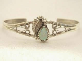 Fire and Ice Lab Opal set in Sterling Silver Bracelet. Beautiful Leaf Design. Created by Navajo Artist Rita Dawes