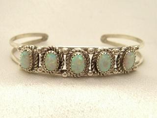 Authentic Native American Jewelry. 5 Beautiful Fire & Ice Lab Opal Stones set in Sterling Silver Bracelet. Created by Navajo Artist Phillip Yazzie.