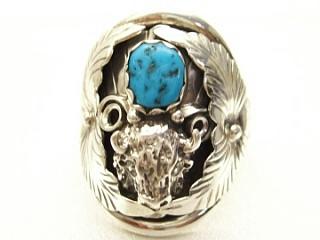 Authentic Native American Jewelry. Genuine Turquoise set in Sterling Silver Ring. Sterling Silver Buffalo and Leaf Design. Navajo Made.