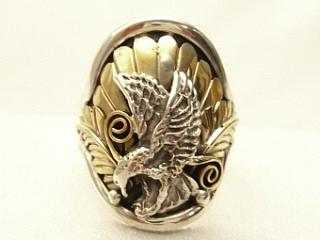 Authentic Native American Jewelry. Sterling Silver Ring with 12K gold fill. Beautiful Eagle Design. Created by Navajo Artist Regina Becenti.

