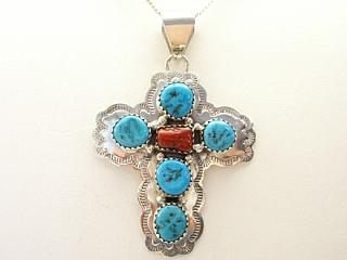 Genuine Sleeping Beauty Turquoise & Blood Red Coral set in Sterling Silver Cross. FREE 18" Sterling Silver Chain with purchase.  Created by Navajo Artist Harry Spencer. Signed