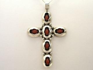 Genuine Coral set in Sterling Silver Cross. FREE 18" Sterling Silver Chain with purchase of Pendant. Created by Navajo Artist Fabian Garcia.