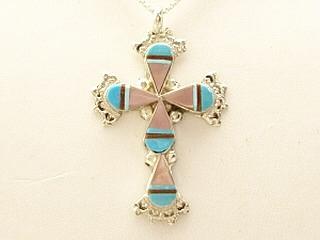 Genuine Turquoise, Mother of Pearl, and Coral set in Sterling Silver Cross Pendant. FREE 18" Sterling Silver Chain with purchase of Pendant. Created by Zuni Artist Alton Nastacio.