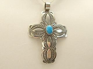 Genuine Turquoise set in Sterling Silver Cross Pendant. FREE 18" Sterling Silver Chain with purchase. Created by Navajo Artist Arnold Blackgoat. Signed BLKGT.