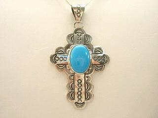 Genuine Sleeping Beauty Turquoise set in Sterling Silver Cross Pendant. FREE 18" Sterling Silver Chain with Purchase of Pendant. Created by Navajo Artist Harry Spencer. Signed.