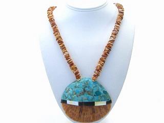 Beautiful Spiny Oyster Shell inlaid with a Mosaic of Genuine Turquoise, Mother of Pearl and Jasper. Genuine Spiny Oyster Shell Necklace with Sterling Silver Cones, Clasp and Extender. Created by Navajo Artist Colbert Sherman. Signed