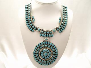 Genuine Turquoise set in Sterling Silver Necklace with Sterling Silver Chain & Clasp. Created by Navajo Artist Juliana Williams. Signed JW.
