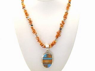 Beautiful Genuine Spiny Oyster Shell and Fire & Ice Lab Opal inlaid in Sterling Silver Pendant. Genuine Coral Necklace with Opal and Onyx accents. Sterling Silver Beads and Clasp. Created by Navajo Artist Thomas Franklin. Signed TF.