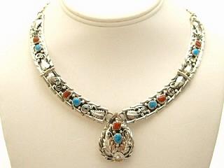 Authentic Native American Jewelry. Genuine Turquoise and Coral set in Sterling Silver Necklace. Sterling Silver Chain and Clasp. Created by Navajo Artist Rita Dawes. Signed D.