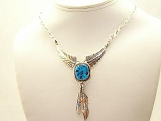 Genuine Sleeping Beauty Turquoise Necklace with Sterling Silver Chain & Clasp. Sterling Silver Feather & Leaf Designs Created by Navajo Artist Rita Dawes. Signed D.