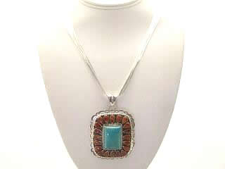 Genuine Turquoise and Spiny Oyster Shell set in Sterling Silver Pendant on a 10 strand 20" Liquid Silver Necklace. Created by Navajo Artist Larry Yazzie. Signed LMY.