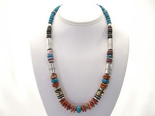 Genuine Assorted Gemstones Necklace with Sterling Silver and Gold Filled Barrels. Featuring Spiny Oyster Shell, Turquoise, Onyx and Jasper. Sterling Silver Beads & Clasp. Created by Navajo Artist Tommy Singer.