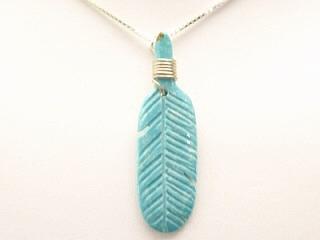 Genuine Turquoise and Sterling Silver Feather Pendant. Free 18" Sterling Silver Chain with Purchase of Pendant. Created by Navajo Artist Jefferson Howe.